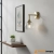 Kinkiet mosiężny z karbowanym szklanym kloszem 103173 z serii Allegra - Endon Lighting