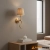 Kinkiet mosiężny z kloszem z rafii 114227 z serii Wriggle - Endon Lighting