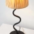 Lampa stołowa czarna metalowa z kloszem z rattanu 100958 z serii Wriggle - Endon Lighting