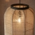 Lampa wisząca czarna z drewnem i ażurowym kloszem 101689 z serii Zaire - Endon Lighting