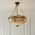 Lampa wisząca witrażowa Tiffany 1122513 z serii Interiors 1900