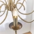 Żyrandol metalowy mosiężny 8-punktowy KORA-8AB z serii Kora - Endon Lighting