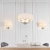 Kinkiet dwupunktowy biały z tkaniny 60180 z serii Nixon - Endon Lighting