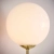 Kinkiet mosiężny z białą kulą 75960 z serii Otto - Endon Lighting