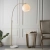 Lampa podłogowa złota łukowa z kulistym kloszem 76613 z serii Otto - Endon Lighting