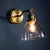 Kinkiet mosiężny ze szklanym kloszem 77273 z serii Hansen - Endon Lighting