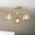 Lampa sufitowa złota 3-punktowa z bursztynowymi kloszami 91968 z serii Dimple - Endon Lighting