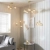 Kinkiet ścienny złoty ze szklanym kloszem 91970 z serii Dimple - Endon Lighting