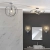Kinkiet chromowany okrągły z włącznikiem sznurkowym 96002 z serii Merola - Endon Lighting